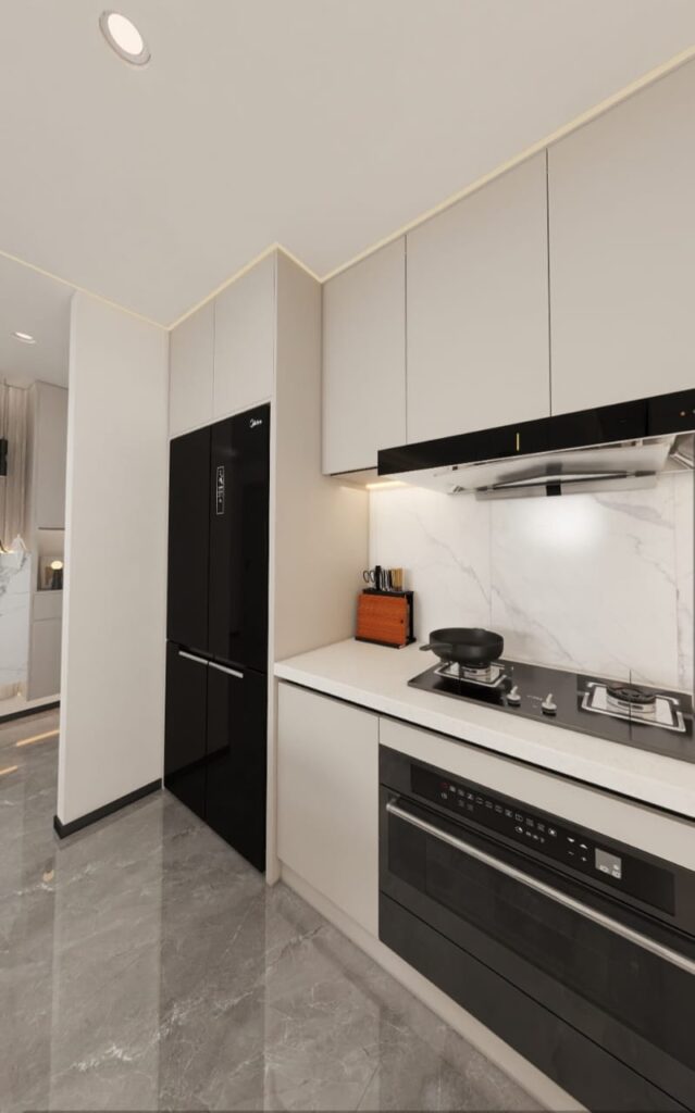 Double door fridge,cooker and hood in the kitchen at an apartment inside Aria Capital Residency in Upperhill,