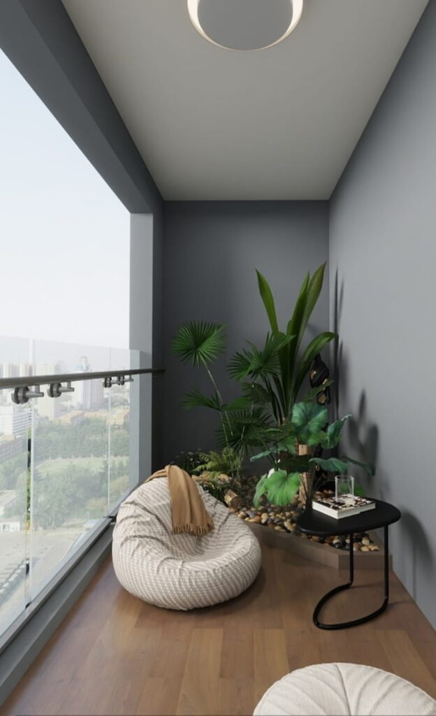 the balcony corner with plants and a seat at Aria Capital Residency in Upperhill