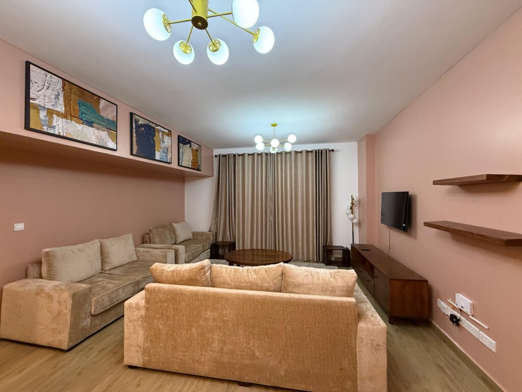 A well lit living room inside the Furnished Apartment at Jade Residence