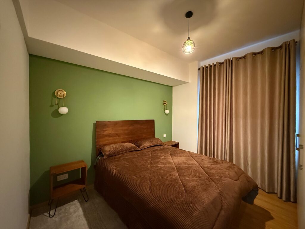 The second bedroom at the Furnished Apartment At Jade