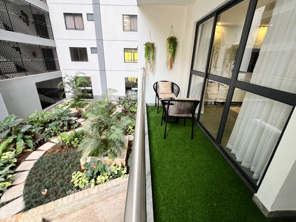 Furnished apartment at winchester Gardens beautiful balcony overlooking a green garden