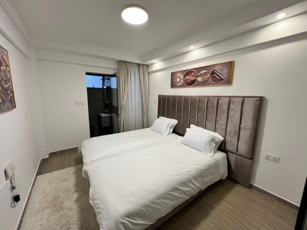 the second bedroom ensuite at the Furnished apartment at winchester Gardens