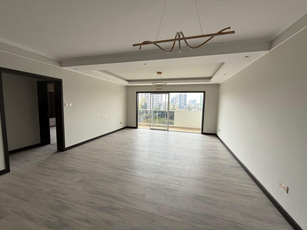 Bright living area with large windows and chandalier at Pearl Rivers unfurnished 2 bedroom