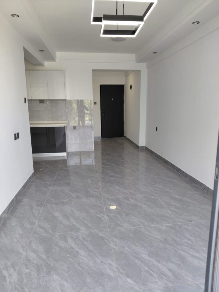 Lounge at Unfurnished 1 Bedroom With a Study at Serenity Residences