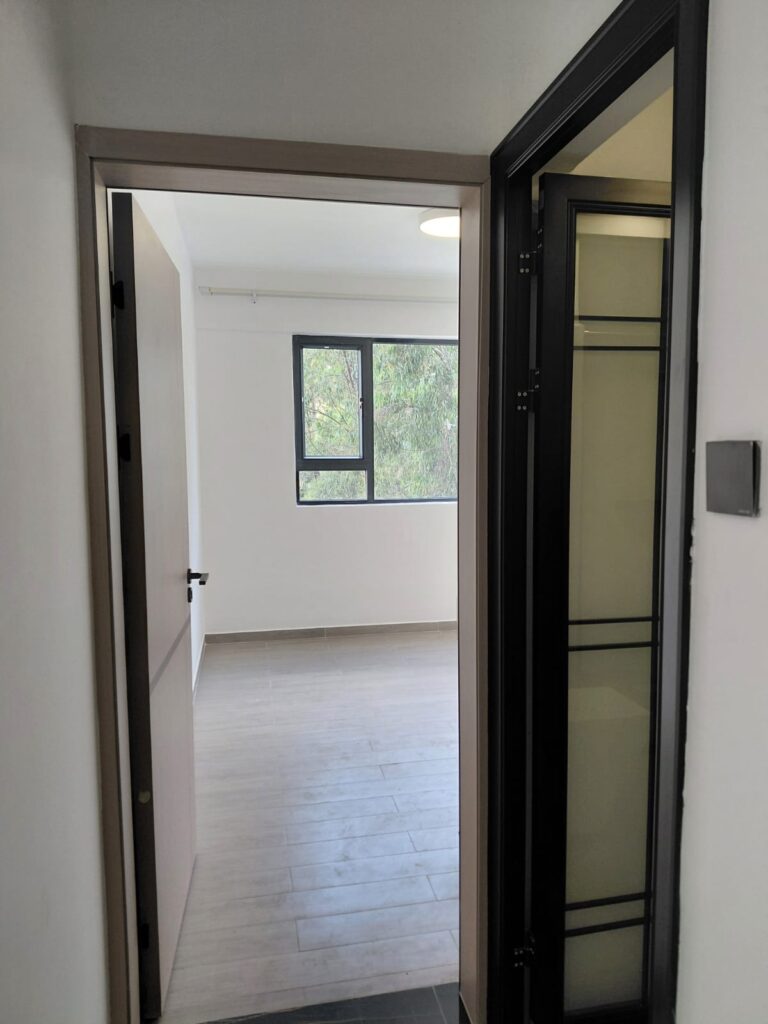 bathroom and bedroom entrance at Unfurnished 1 Bedroom With a Study at Serenity Residences