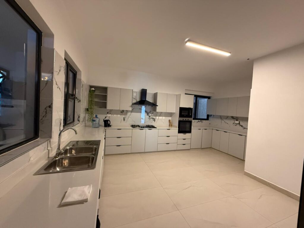 Fitted kitchen at 4 Bedroom All Ensuite Duplex at Emaar Residence.