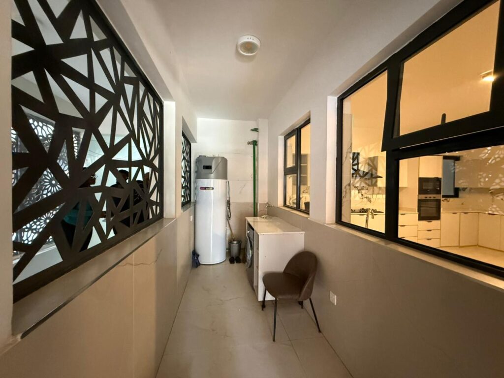Laundry Area at 4 Bedroom All Ensuite Duplex at Emaar Residence.